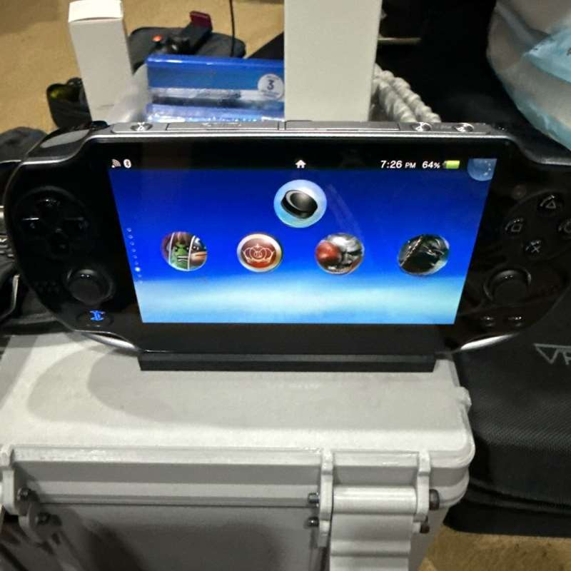 Tragbarer Spielkonsolen-Stände – Gaming Console Display Bewertung und Preis