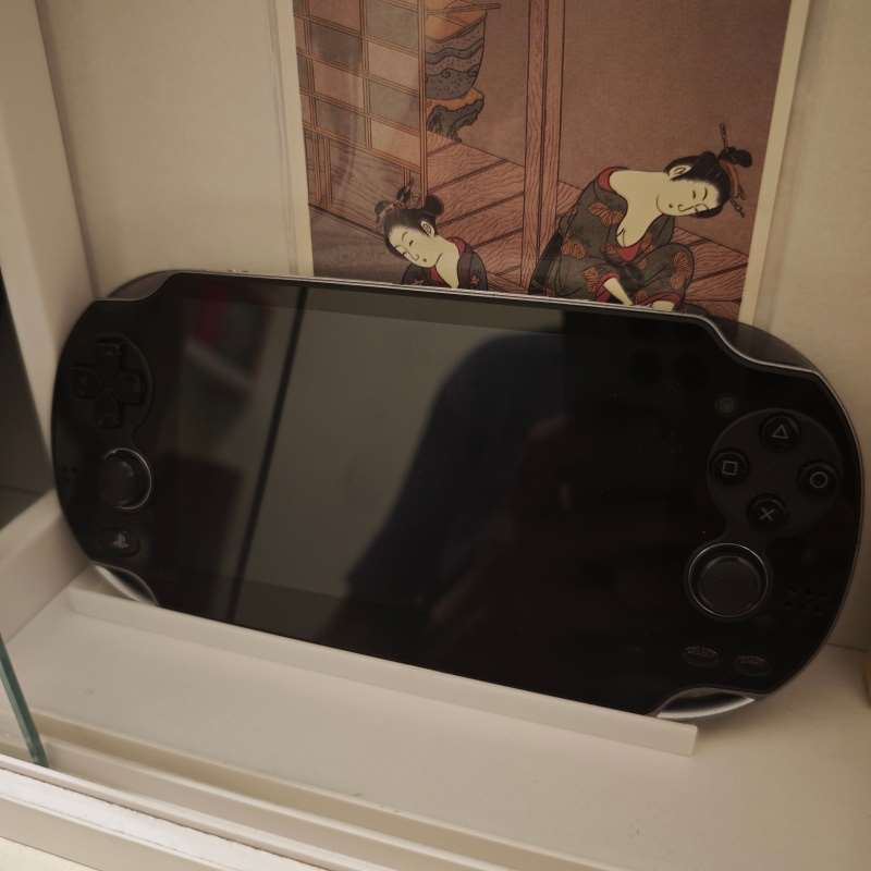 Tragbarer Spielkonsolen-Stände – Gaming Console Display Bewertung und Preis